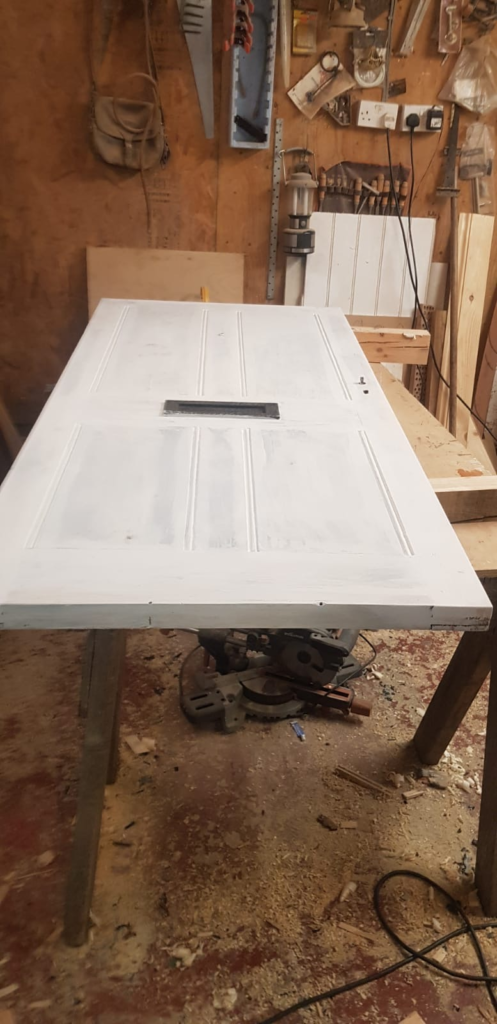 unpainted door in carpentry shop